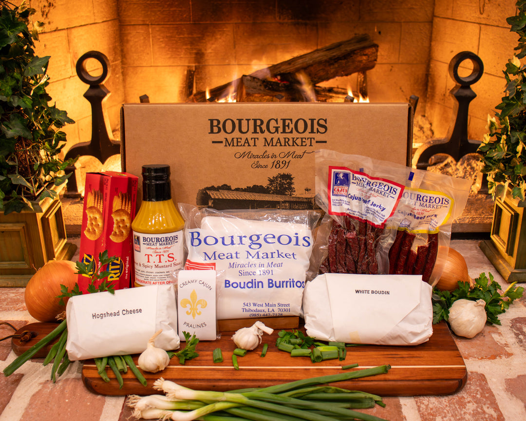Handcrafted Cajun gift box from Bourgeois Meat Market, featuring premium smoked meats, boudin, and authentic Louisiana flavors—perfect for holidays, birthdays, and corporate gifts.