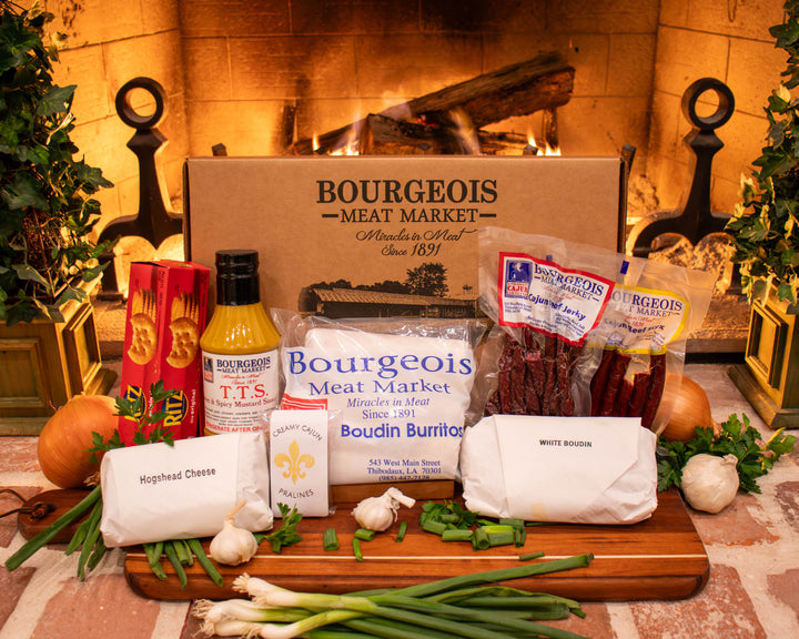 Handcrafted Cajun gift box from Bourgeois Meat Market, featuring premium smoked meats, boudin, and authentic Louisiana flavors—perfect for holidays, birthdays, and corporate gifts.