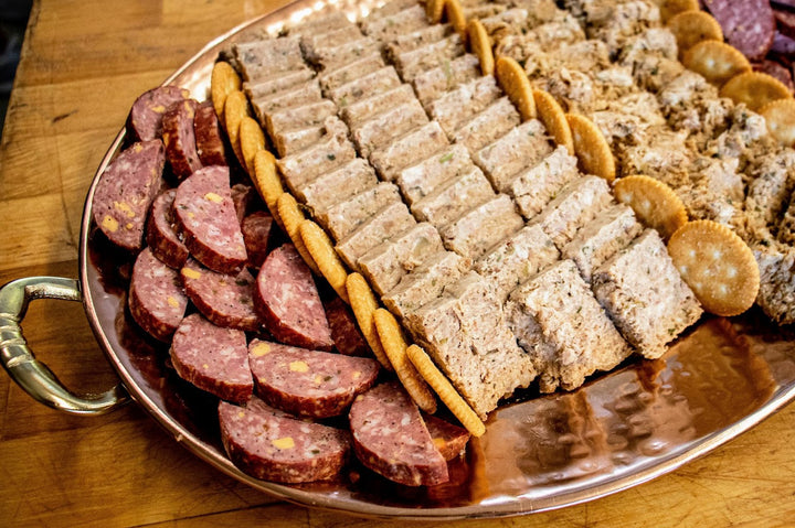 Handcrafted Cajun wood-smoked summer sausage from Bourgeois Meat Market—bold, savory flavor perfect for charcuterie boards, road trips, and protein-packed snacks.