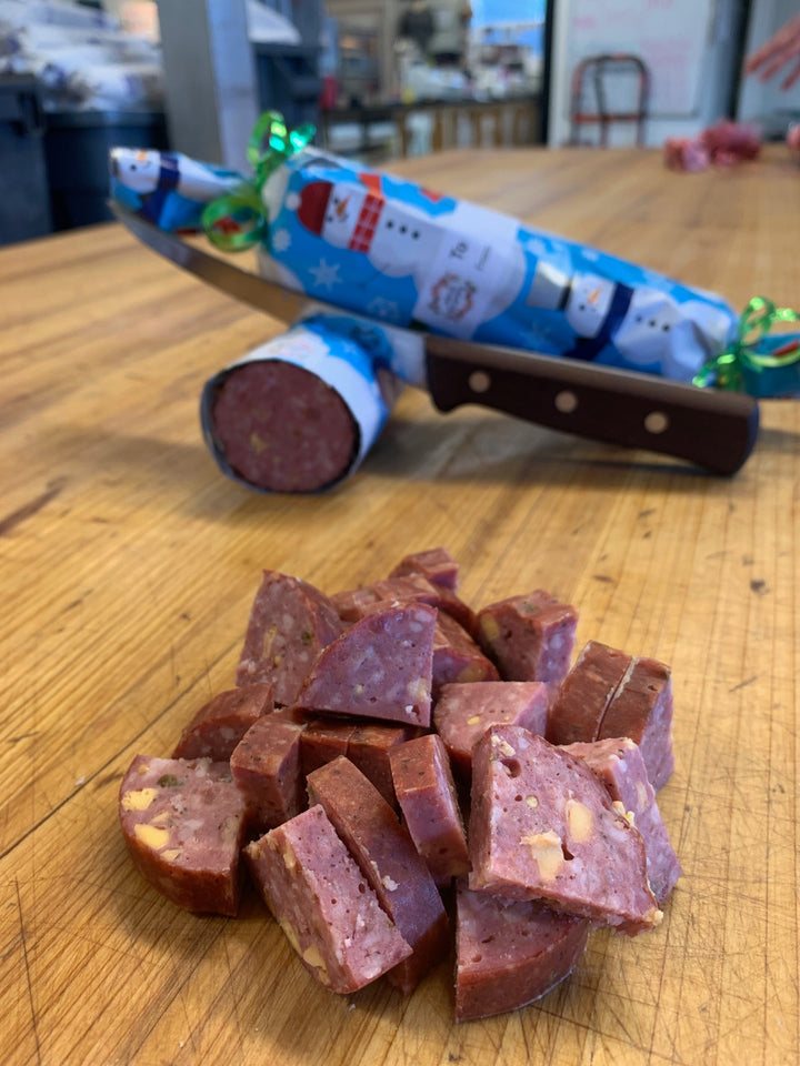 Handcrafted Cajun wood-smoked summer sausage from Bourgeois Meat Market—bold, savory flavor perfect for charcuterie boards, road trips, and protein-packed snacks.