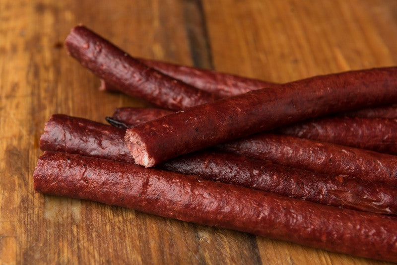 Premium smoked meats gift box from Bourgeois Meat Market, packed with Cajun wood-smoked sausage, summer sausage, and jerky—perfect for meat lovers.