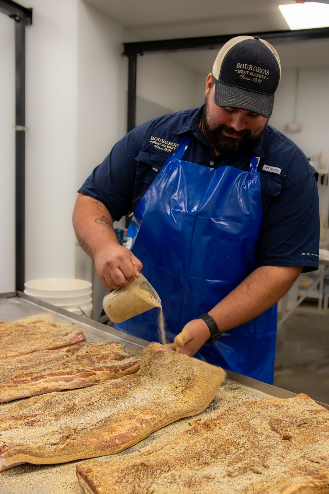 Thick-cut Bourgeois Cajun Smoked Bacon, perfectly seasoned with bold Cajun spices and slow-smoked over natural hardwoods for a rich, smoky flavor. A Southern favorite for breakfast, sandwiches, or cooking