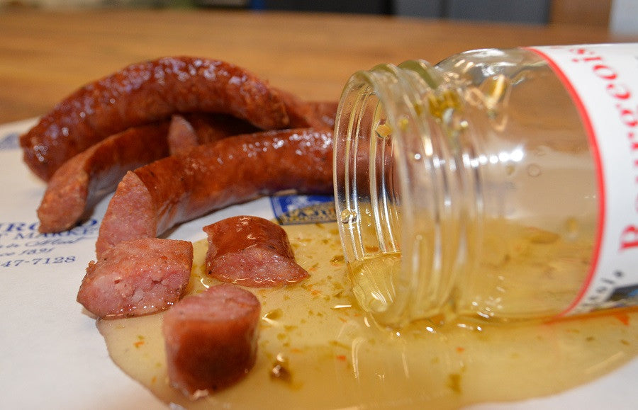 Cajun Pepper Jelly from Bourgeois Meat Market, a sweet and spicy Louisiana favorite inspired by Ms. Deanna Butler's recipe, perfect for boudin, crackers, or cream cheese.