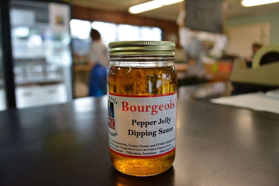 Cajun Pepper Jelly from Bourgeois Meat Market, a sweet and spicy Louisiana favorite inspired by Ms. Deanna Butler's recipe, perfect for boudin, crackers, or cream cheese.