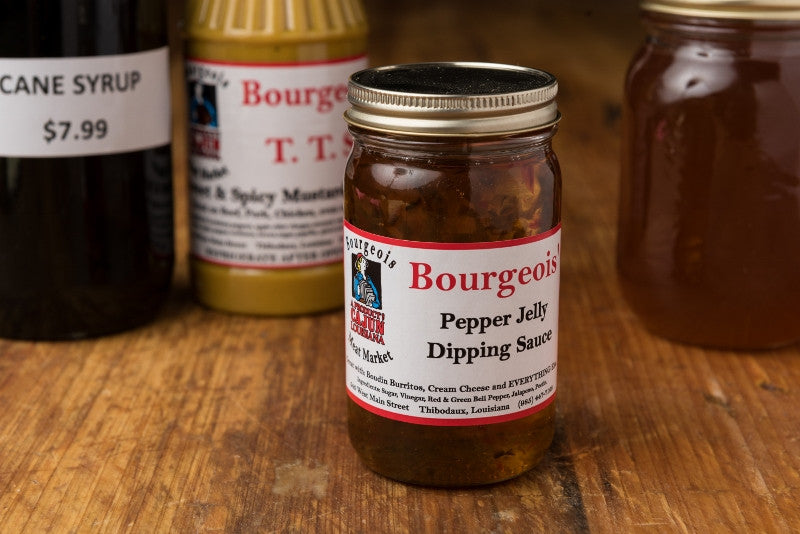 Cajun Pepper Jelly from Bourgeois Meat Market, a sweet and spicy Louisiana favorite inspired by Ms. Deanna Butler's recipe, perfect for boudin, crackers, or cream cheese.