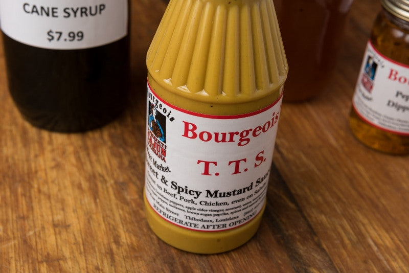 TTS Sweet and Spicy Mustard Sauce by Bourgeois Meat Market, a versatile Cajun condiment for dipping, dressing, and battering with bold Louisiana flavors.